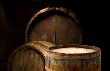 Wooden barrel on a table and textured background