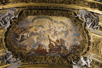 Shot of beautiful frescos on the ceiling of the Church of the Gesu in Rome, Italy