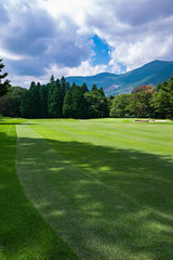 Golf Course with beautiful green field. Golf course with a rich green turf beautiful scenery.