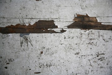 Wooden surface with paint peeling off