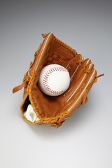 Baseball glove with baseball