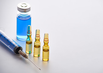 Medical vial and ampoules for injection and syringe. medicines and disease treatment. pharmacology...