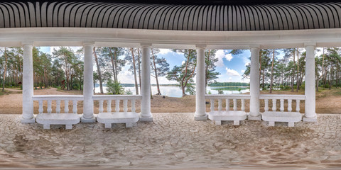 full seamless hdri panorama 360 degrees view inside concrete gazebo with columns in pinery forest...
