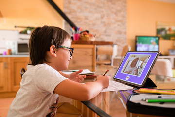 young boy working on tablet