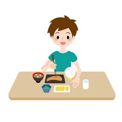 男の子がご飯を食べるシーン