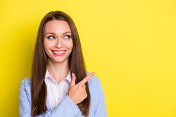 Look business advert. Positive representative agent girl point index finger copyspace demonstrate promo wear suit isolated over bright shine color background