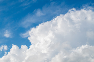 Naklejka na ściany i meble white cumulus clouds in the blue sky