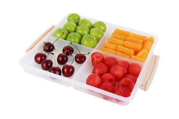 colorful fruits in white fruit container