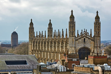 Aerial view of Kings College in Cambridge, UK, under cloudy skies