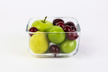 colorful fruits  in a glass bowl