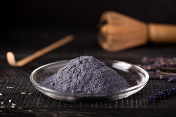 blue matcha powder on a glass plate