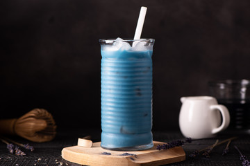 iced blue matcha with milk in a glass