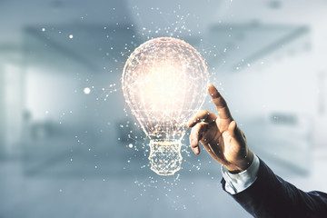 Double exposure of male hand presses on creative light bulb hologram on blurred office background,...
