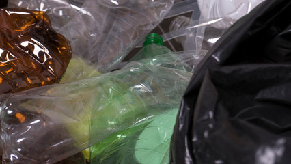 Empty colored carbonated drink bottles. Plastic waste