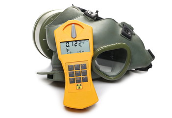 Military gas mask with Geiger counter isolated on white background