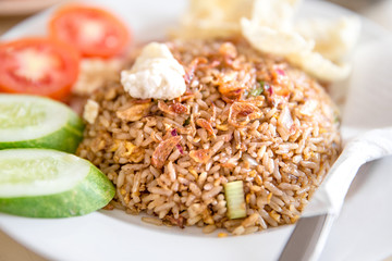 Indonesian Freid Rice With Cucumbers and Tomatoes.
