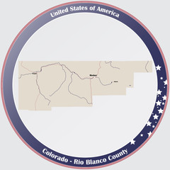 Round button with detailed map of Rio Blanco County in Colorado, USA.