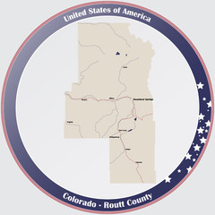 Round button with detailed map of Routt County in Colorado, USA.