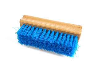 blue square wooden brush isolated on white backrgound