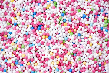 Fototapeta na wymiar Colorful eatable sugar pearls for food decoration
