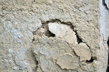 Photo of damaged clay wall