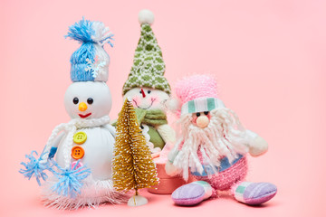 christmas decoration on pastel pink background, copy space