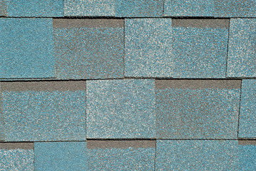 Obraz premium Flexible tile is made of fiberglass impregnated with bitumen. Blue roof texture close up.