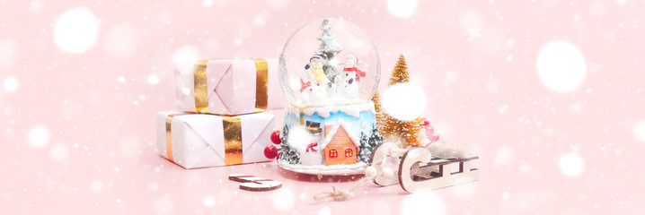 Banner, Christmas composition, gifts on pastel pink background, copy space
