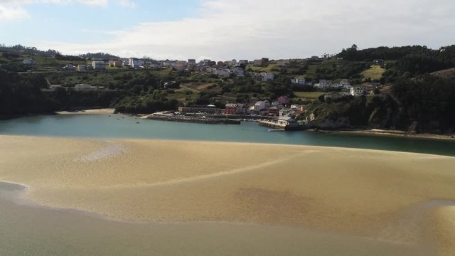 Aerial view in O Barqueiro, beautiful coastal village in Galicia,Spain. Drone Footage