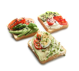 Tasty sandwiches on white background