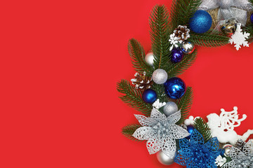 christmas wreath on a red background, flatley, copyspace