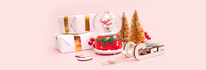 Banner, Christmas composition, gifts on pastel pink background, copy space