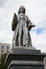 Obraz premium A statue of Isaac Watts a well known hymn writer and Christian Minister at Watts Park in Southampton, Hampshire, UK
