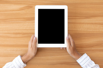 Shot of woman using her tablet with blank screen