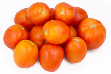Pile of tomatoes on a white backdrop, an Asian fresh vegetables