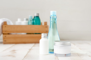 Cosmetics for hair on wooden table