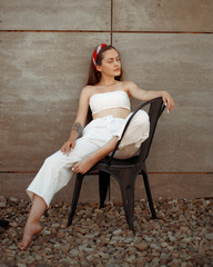 fashion portrait of girl in white outfit