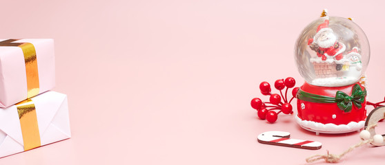 Banner, Christmas composition, gifts on pastel pink background, copy space