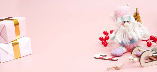 Banner, Christmas composition, gifts on pastel pink background, copy space