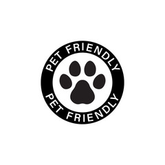 Pet paw or dog label. Footprint with pet friendly text. Vector on isolated white background. EPS 10