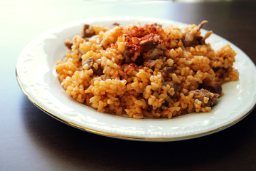 Bulgur wheat cooked with meat and spices