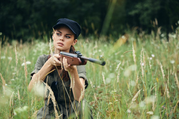 Woman on outdoor Hunting for shelter with weapons 