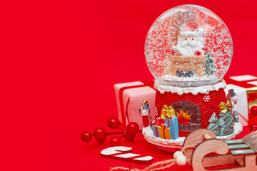 Christmas composition, gifts on red background, copy space