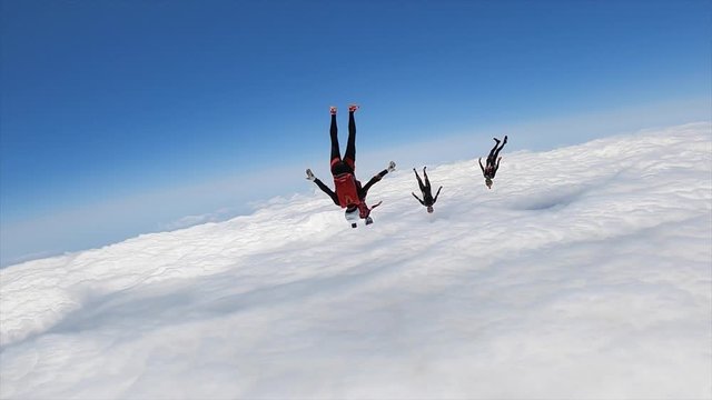 Skydiving Dance with Clouds in Spain