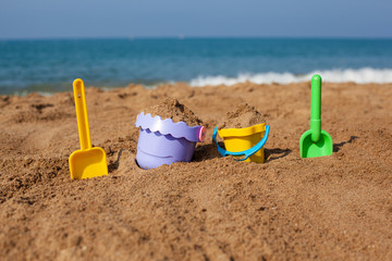 Children's toys for the beach buckets and shovels. Play in the sand on the beach.