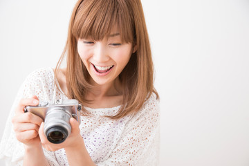 Fototapeta premium 女性カメラマン