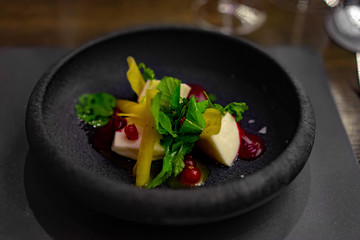 goat cheese with salad and red currant sauce fine dining appetizer