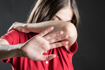 violence against women, teen girl in defense position