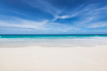 Tropical beach and turquoise sea. Luxury travel summer holiday background concept. 