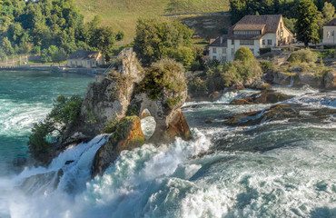 Fototapeta na wymiar rocks and rapids of the Rhine waterfall